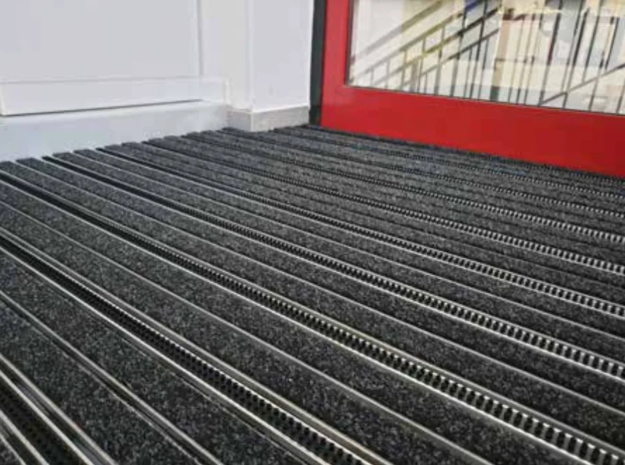 Tapis en rail aluminium