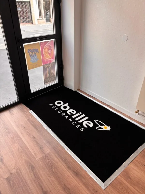 Tapis logo fibre synthétique